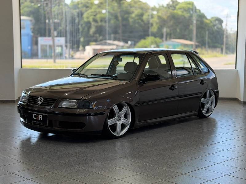 VOLKSWAGEN - GOL - 2002/2002 - Marrom - R$ 22.900,00